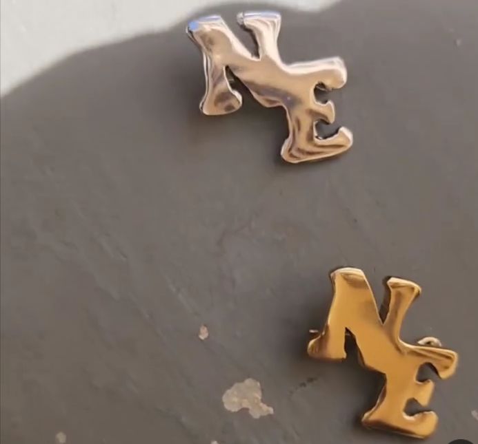 Custom metal lapel brooch set in golden and silver Custom metal lapel brooch set in golden and silver Nairobi Kenya