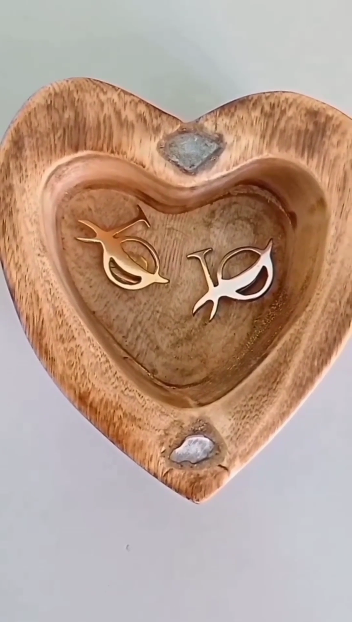Custom metal lapel brooches in heart shaped gift box. Custom metal lapel brooches in a heart shaped gift box in Nairobi Kenya.