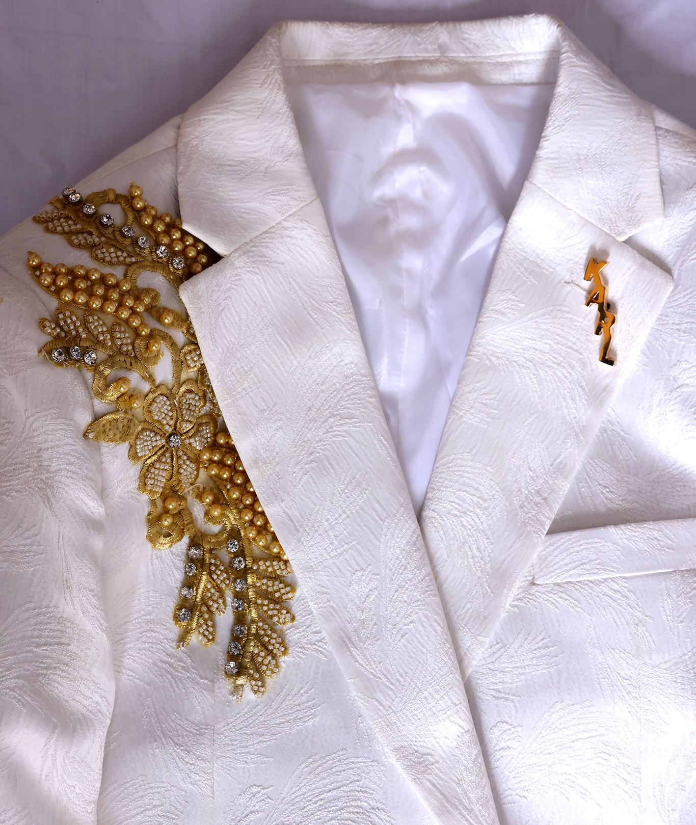white-wedding-tuxedo-nairobi-kenya Beaded white wedding tuxedo Nairobi Kenya